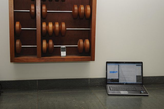 A smartphone and laptop on a desk (stock image)