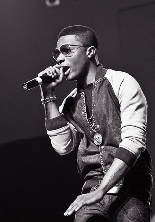 Wizkid performing on stage